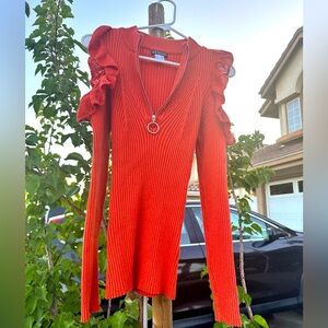 New condition, cold shoulder, ruffle sleeved, zip front sweater!